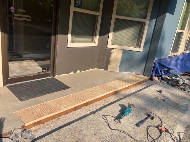 office building water damage restoration process. wood rot replacement