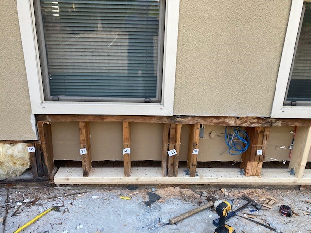 replacing studs because of water damage after years of not maintained office building