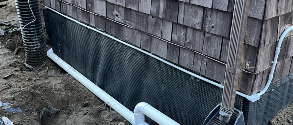French drain and downspout drainage redirection at a Seattle-area home