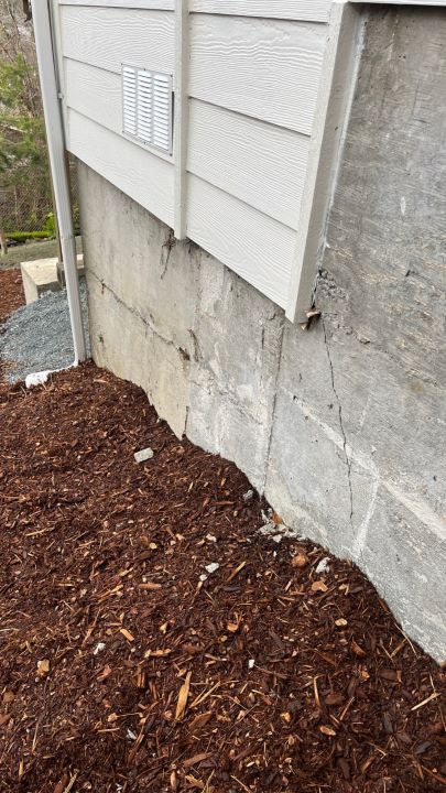 View of a moderate foundation crack before carbon fiber reinforcement Seattle's project Basement Expert by Artbrick LLC