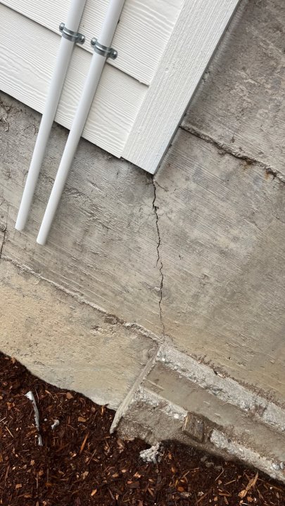 View of a moderate foundation crack before carbon fiber reinforcement Seattle's project