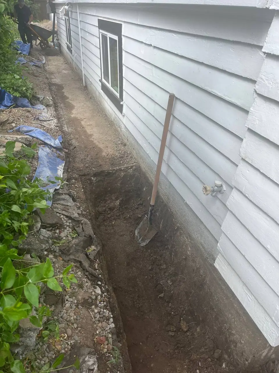 Excavation trench for exterior footing drain installation