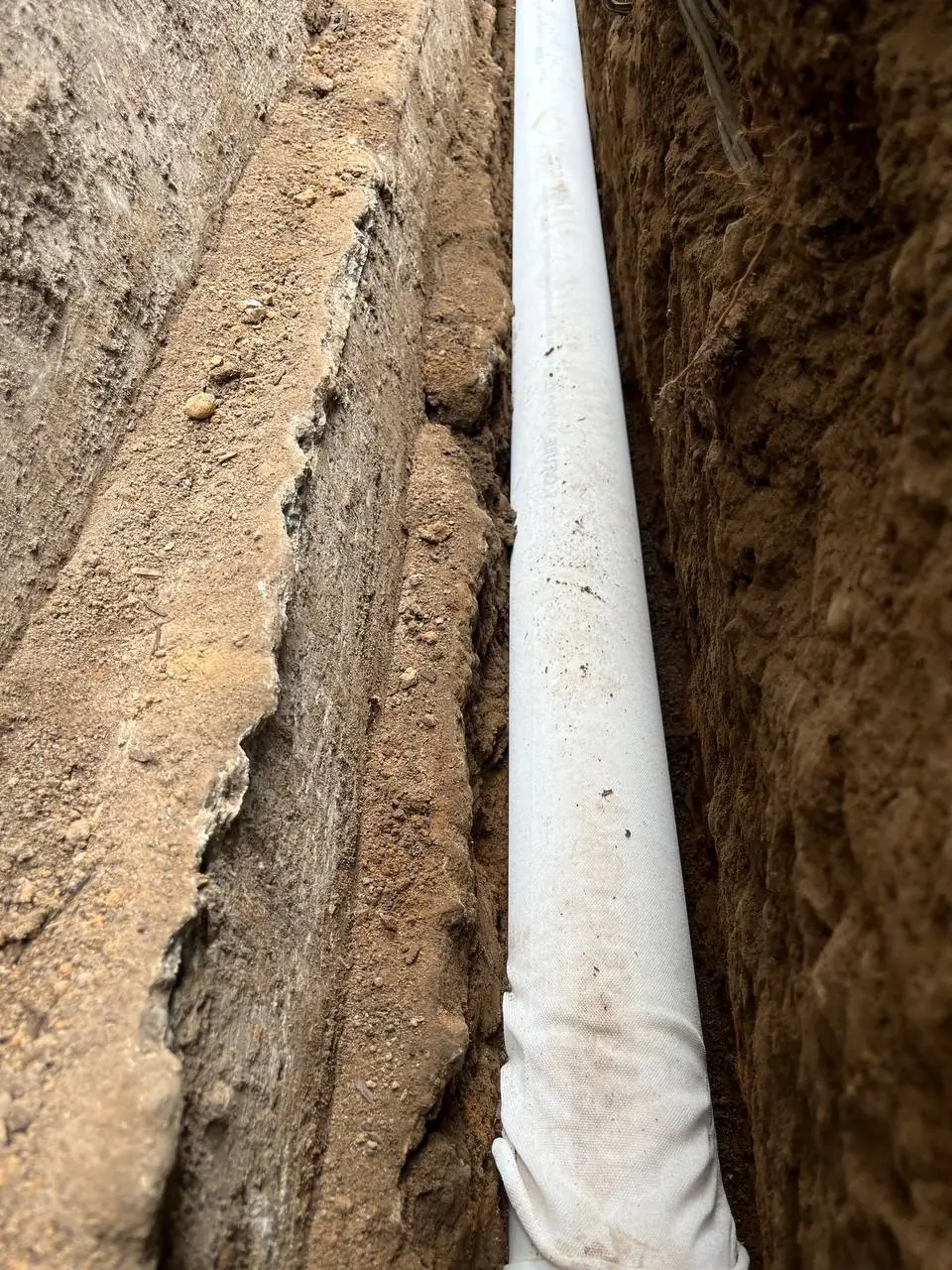 fabric-sock-drainage-pipe-against-foundation-bothell-wa Foundation drainage and waterproofing work by Basement Expert